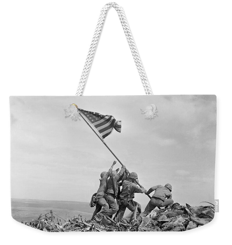 Iwo Jima Weekender Tote Bag featuring the photograph Raising the Flag on Iwo Jima - WW2 - 1945 by War Is Hell Store