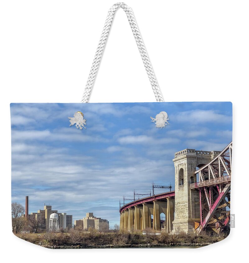 Astoria Park Weekender Tote Bag featuring the photograph Randalls Island and Hell Gate Bridge by Cate Franklyn