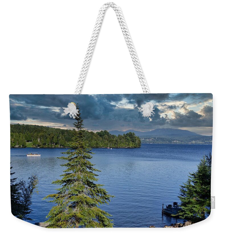 Boat Weekender Tote Bag featuring the photograph Rangeley Lake Storm Clouds Vu East by Russel Considine