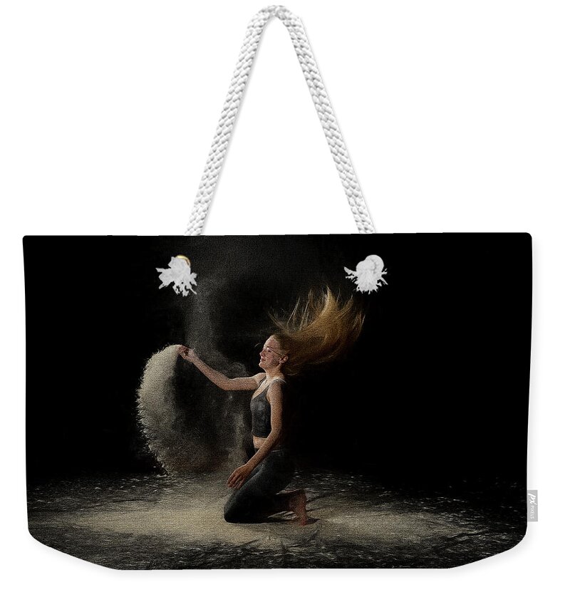 Reagan Weekender Tote Bag featuring the photograph Reagan with hair flip and flour toss by Dan Friend