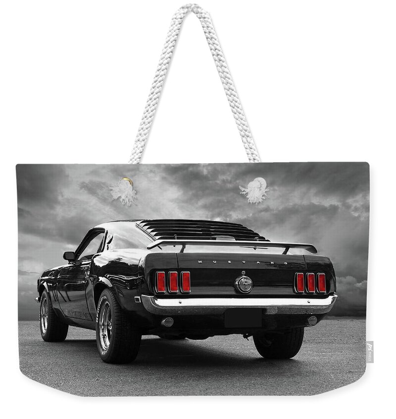 Ford Mustang Weekender Tote Bag featuring the photograph Rear Of The Year - '69 Mustang by Gill Billington