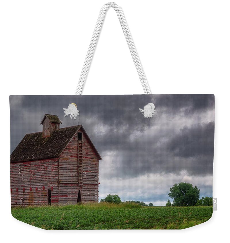 Storm Weekender Tote Bag featuring the photograph Red Ladder Barn in Storm by Darren White