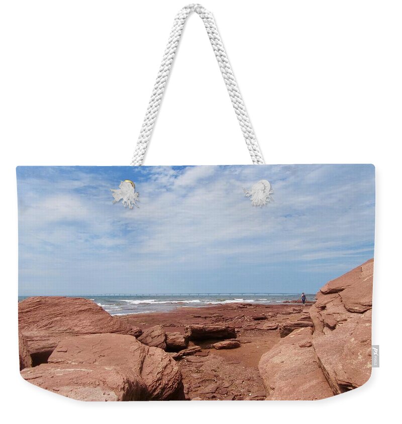 Sandstone Rocks Ocean Weekender Tote Bag featuring the photograph Red Rocks by Stephanie Moore