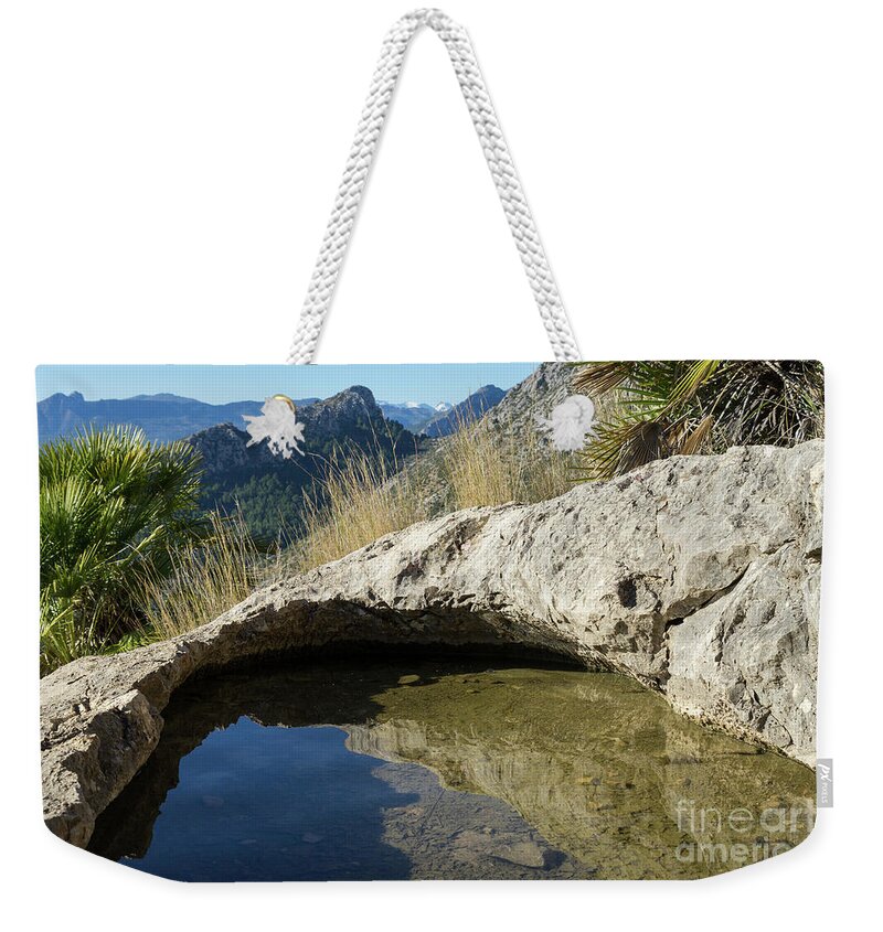 Water Weekender Tote Bag featuring the photograph Water hole in the mountains by Adriana Mueller