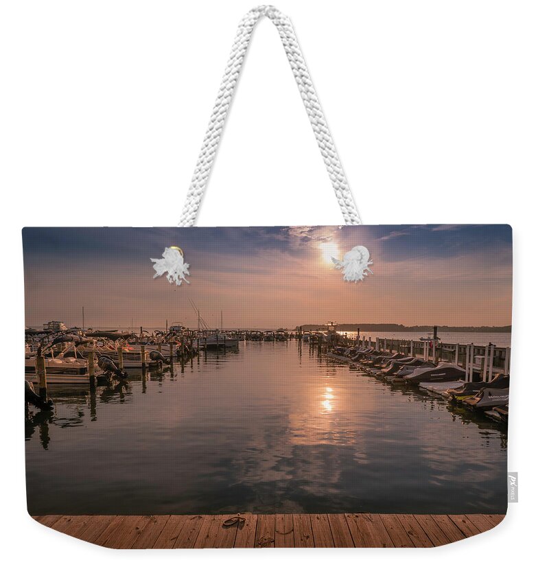 Rehoboth Weekender Tote Bag featuring the photograph Rehoboth Bay Marina Golden Hour by Jason Fink
