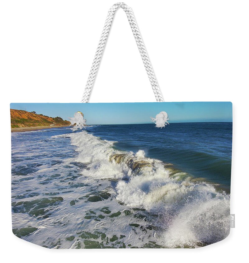 Ocean Weekender Tote Bag featuring the photograph Ride the Waves by Marcus Jones