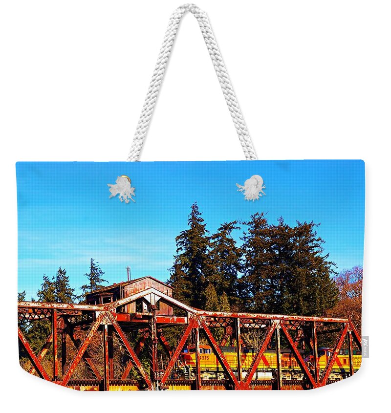 Washington Weekender Tote Bag featuring the photograph Rid'n the Rails by Steve Warnstaff