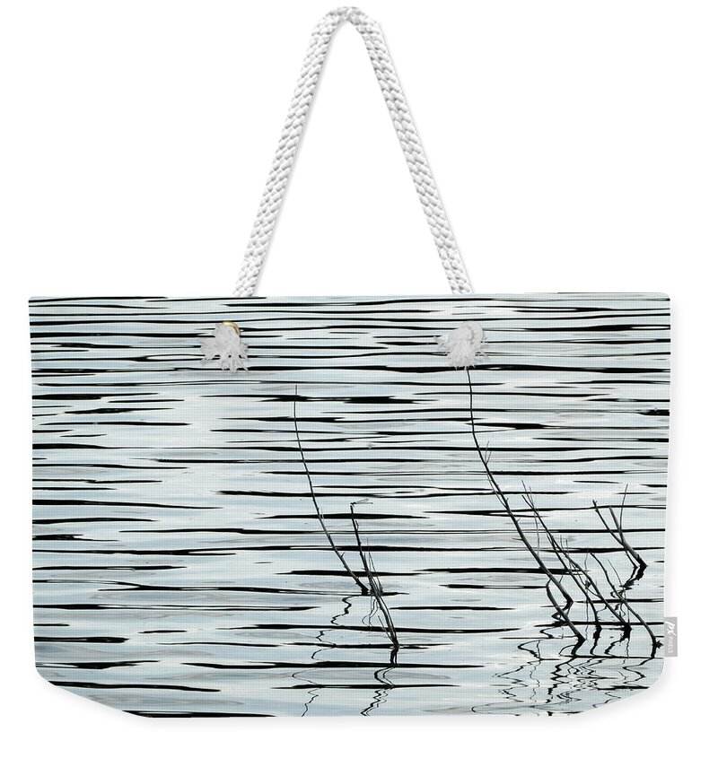 Water Weekender Tote Bag featuring the photograph Ripples in Pale Blue by Mary Lee Dereske