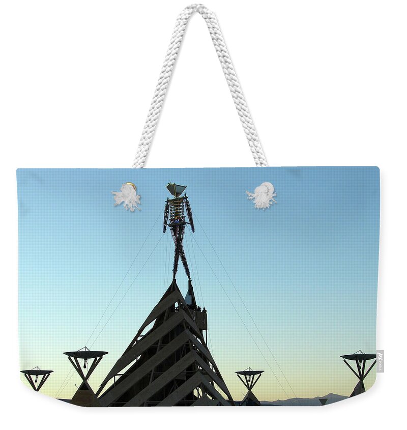 Black Weekender Tote Bag featuring the photograph Rites Of Passage by Carl Moore