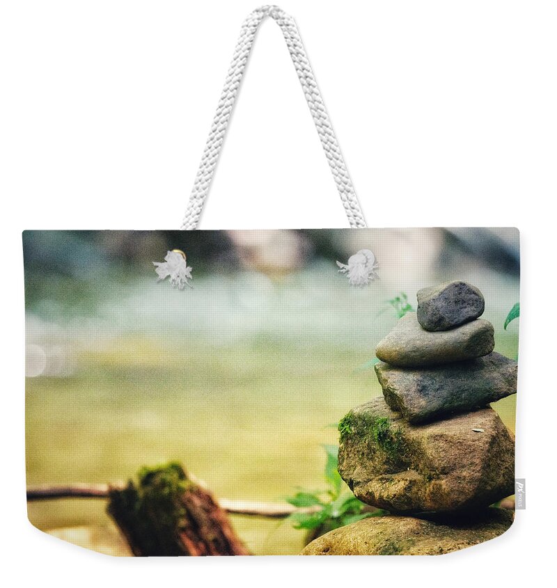 Photo Weekender Tote Bag featuring the photograph Riverside Cairn by Evan Foster