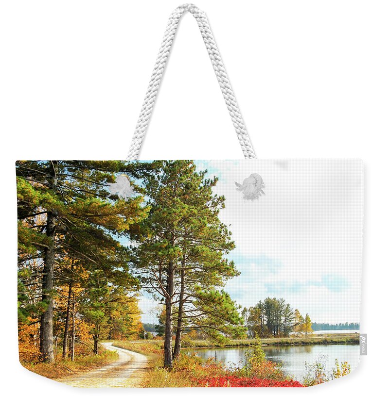 Seney National Wildlife Refuge Weekender Tote Bag featuring the photograph Road Through the Wildlife Refuge by Robert Carter