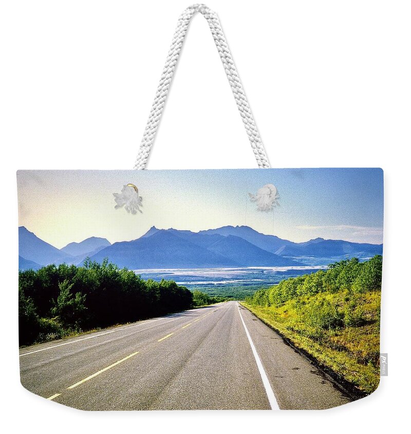 Badlands Weekender Tote Bag featuring the photograph Road to the Badlands by Gordon James