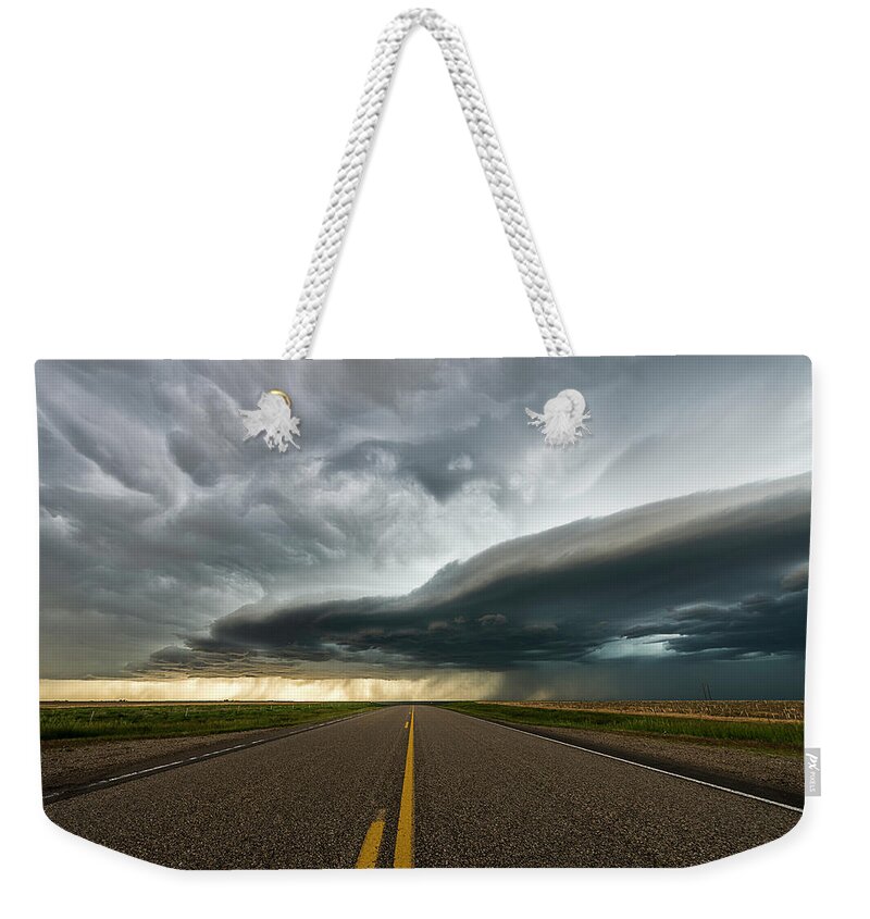 Road Weekender Tote Bag featuring the photograph Road To The Storm by Marcus Hustedde