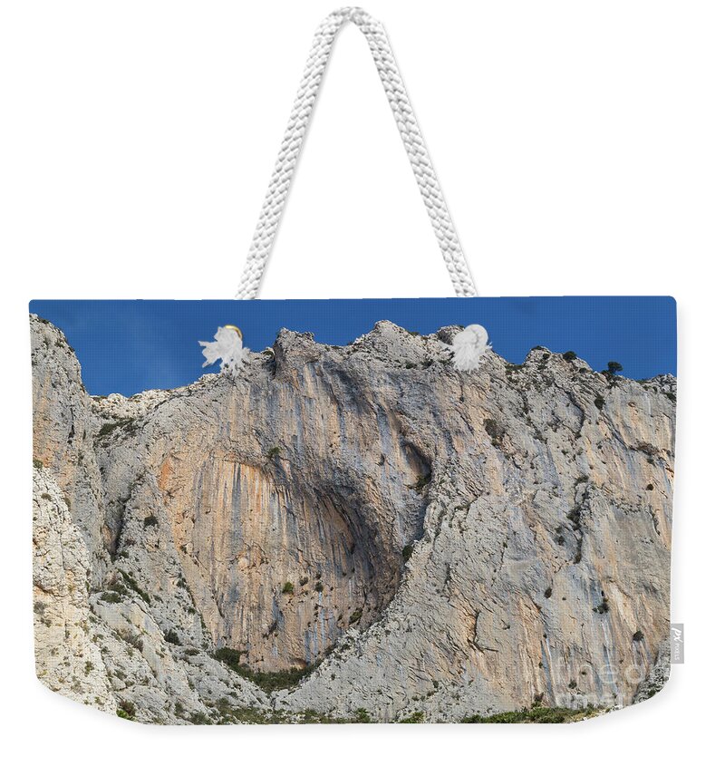 Mountains Weekender Tote Bag featuring the photograph Rock formation in the mountains of Bernia by Adriana Mueller