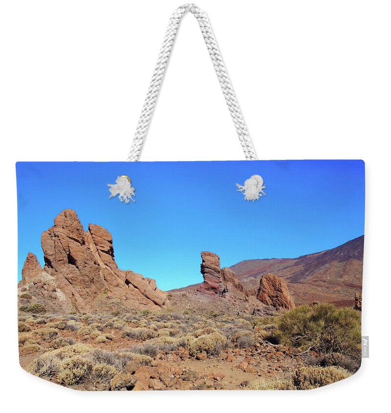 Rock Weekender Tote Bag featuring the photograph Rocks And Mountain - Tenerife by Philip Openshaw