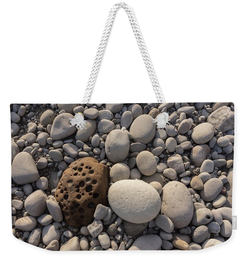 Contrast Weekender Tote Bag featuring the photograph Rocks and pebbles by Mike Fusaro