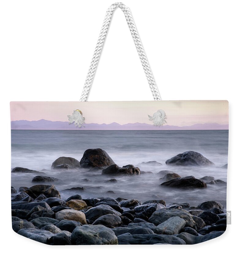 Mist Weekender Tote Bag featuring the photograph Rocky Beach at Sunset by Naomi Maya