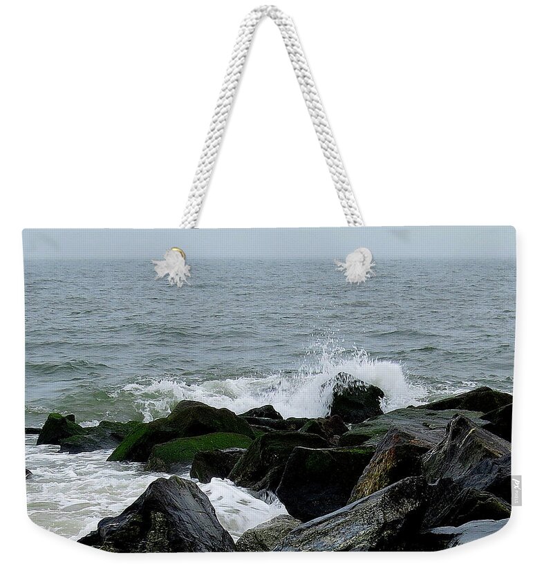 Waves Weekender Tote Bag featuring the photograph Rocky Shores of the Atlantic Ocean in Cape May New Jersey by Linda Stern