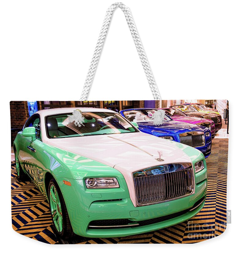 Rolls Royce Resorts World Weekender Tote Bag featuring the photograph Rolls Royce Display at Resorts World Las Vegas by Aloha Art
