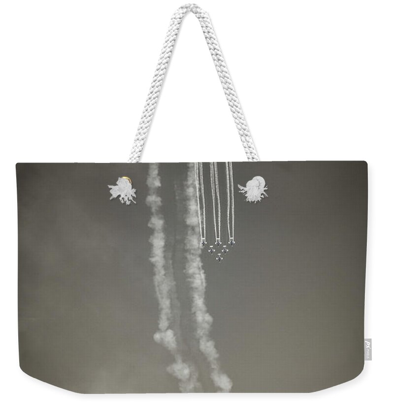 Roulettes Weekender Tote Bag featuring the photograph Roulettes by Ari Rex