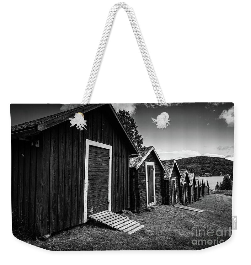 Bonhamn Weekender Tote Bag featuring the photograph Row of beauty by Micah May