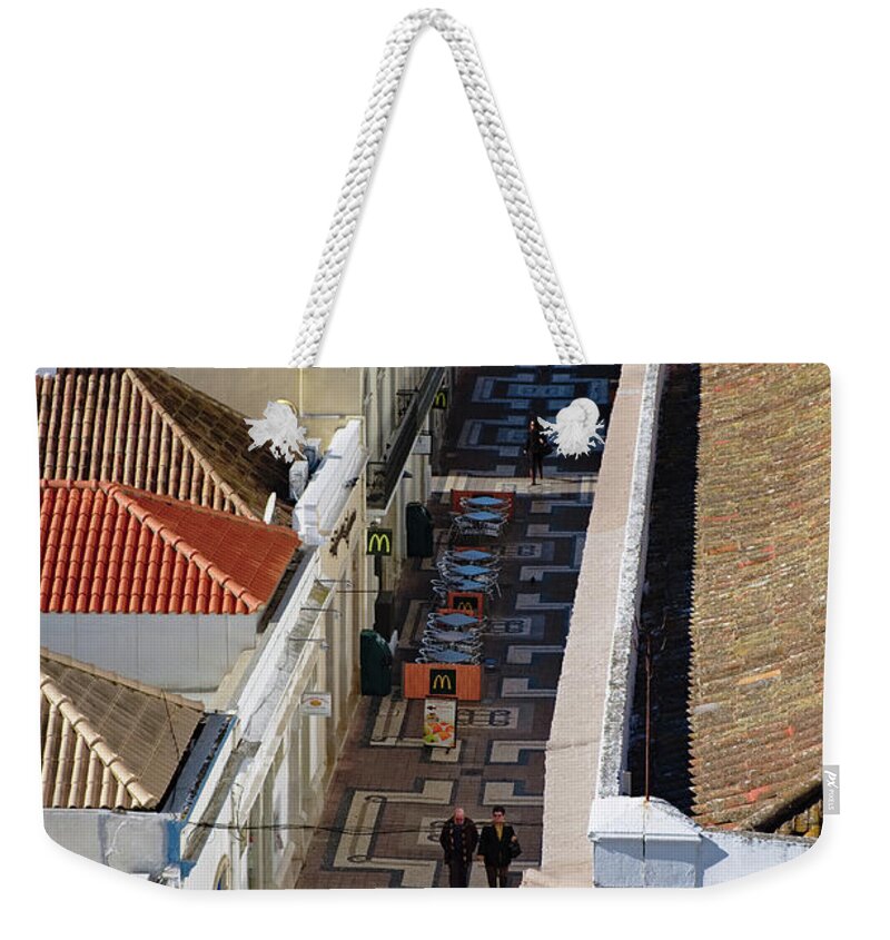 Faro Weekender Tote Bag featuring the photograph Rua do Crime in Faro by Angelo DeVal