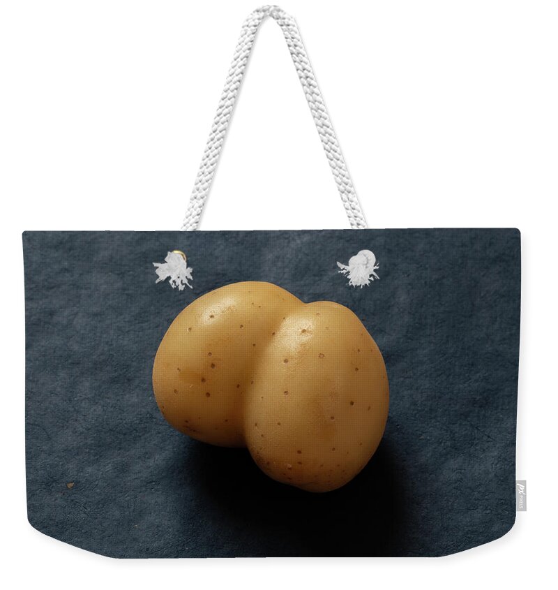 Potato Weekender Tote Bag featuring the photograph Rude Potato Blue Background #2 by David Smith