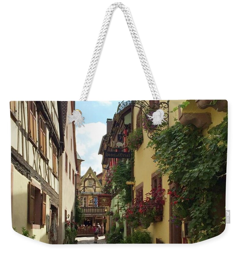 Rue Des Écuries Weekender Tote Bag featuring the photograph Rue des Ecuries by Flavia Westerwelle