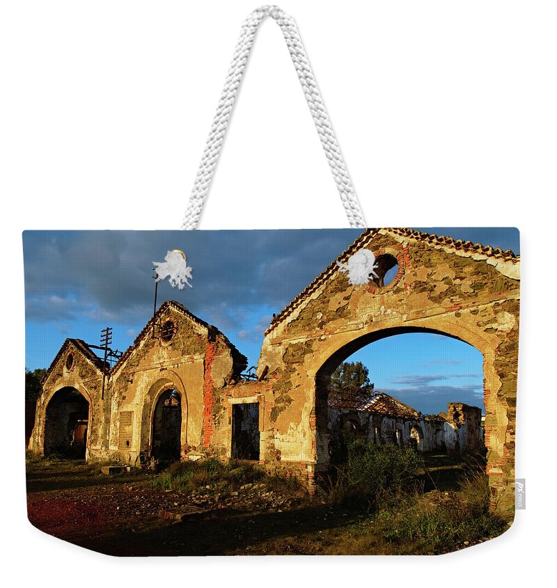 Mertola Weekender Tote Bag featuring the photograph Ruins of the abandoned mine of Sao Domingos. Portugal by Angelo DeVal