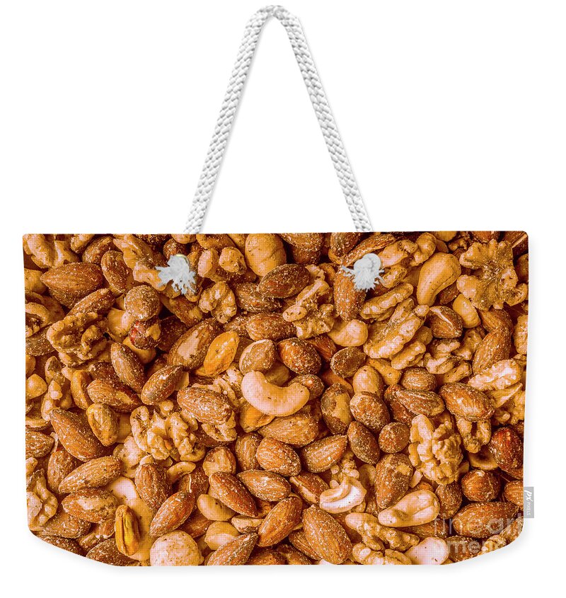 Nut Weekender Tote Bag featuring the photograph Rustic nut mix by Jorgo Photography