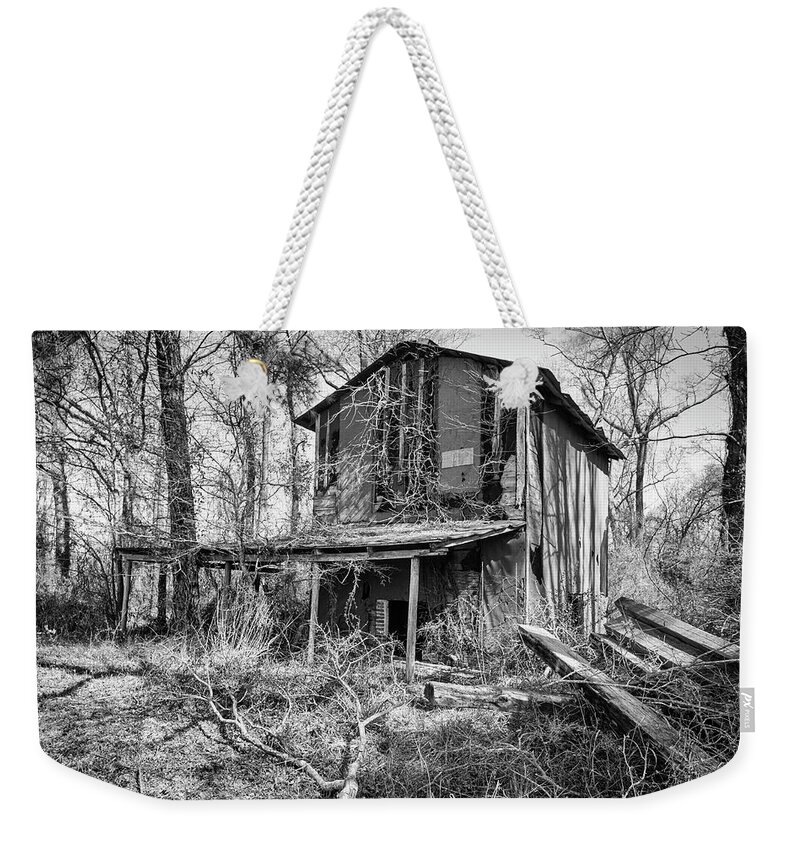 Rustic Weekender Tote Bag featuring the photograph Rustic Old Tobacco Barn Along a Jones County North Carolina Back by Bob Decker