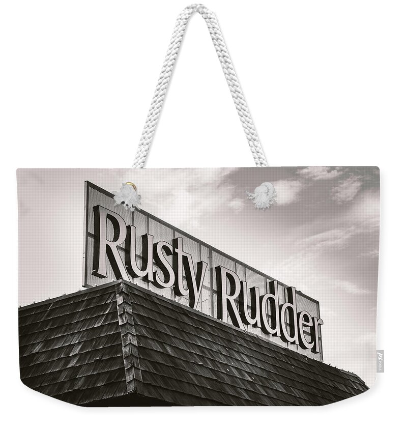 Rusty Weekender Tote Bag featuring the photograph Rusty Rudder Sign by Jason Fink