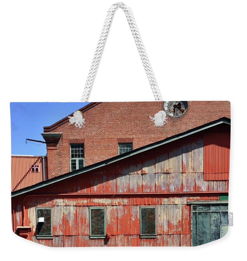  Weekender Tote Bag featuring the photograph Rusty Warehouse by Julie Gebhardt