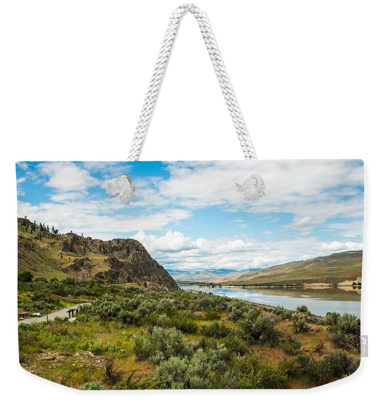 Sagebrush And Sky Weekender Tote Bag featuring the photograph Sagebrush and Sky by Tom Cochran