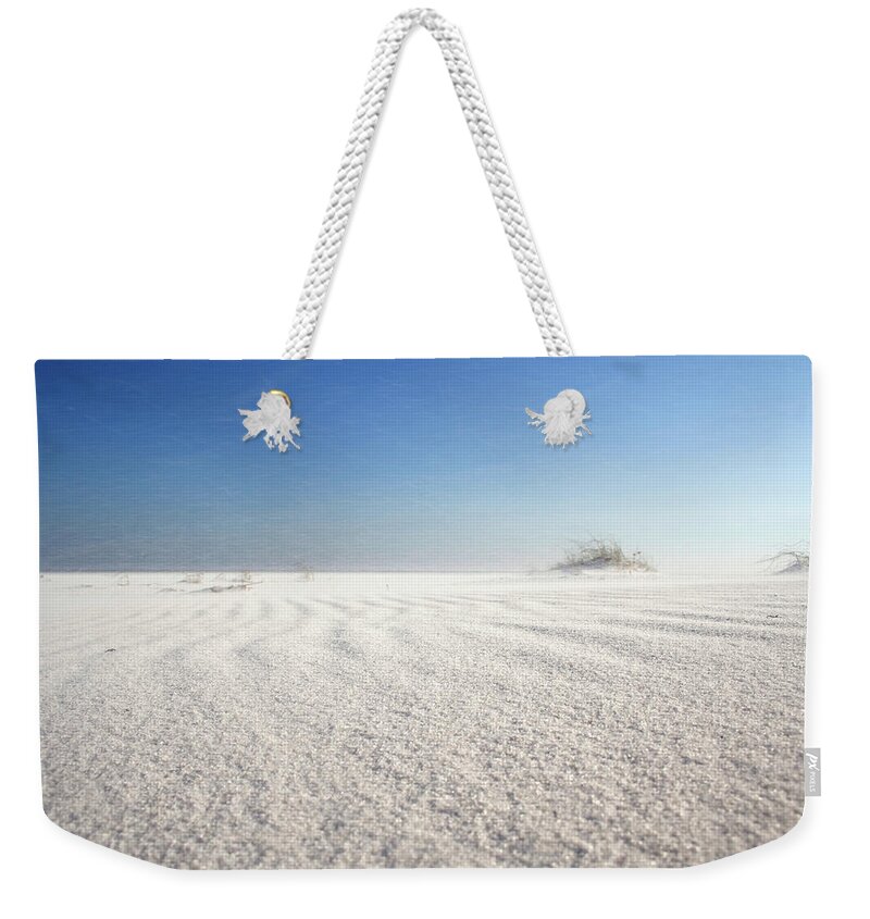 Sandblasting Weekender Tote Bag featuring the photograph Sandblasting by Dylan Punke