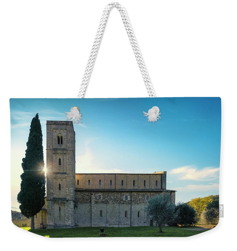 Montalcino Weekender Tote Bag featuring the photograph Sant Antimo Abbey in the Morning by Stefano Orazzini