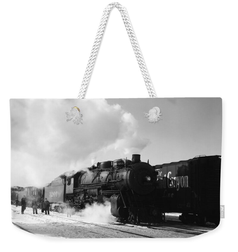 Freight Train Weekender Tote Bag featuring the photograph Santa Fe Freight Train Leaving Chicago - 1943 by War Is Hell Store