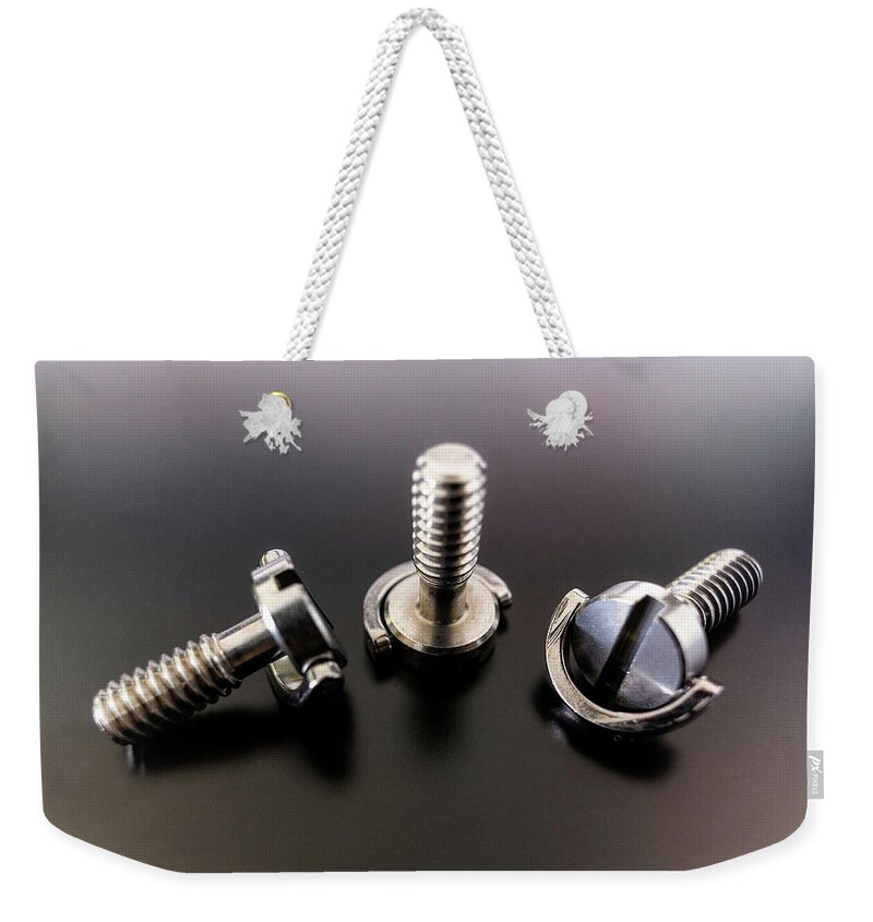 1/4 Inch Weekender Tote Bag featuring the photograph Screws triplet by Micah Offman