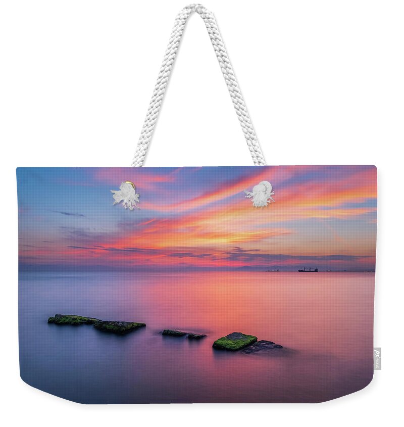 Thessaloniki Weekender Tote Bag featuring the photograph Sea of Tranquility and a Colorful Sunset by Alexios Ntounas