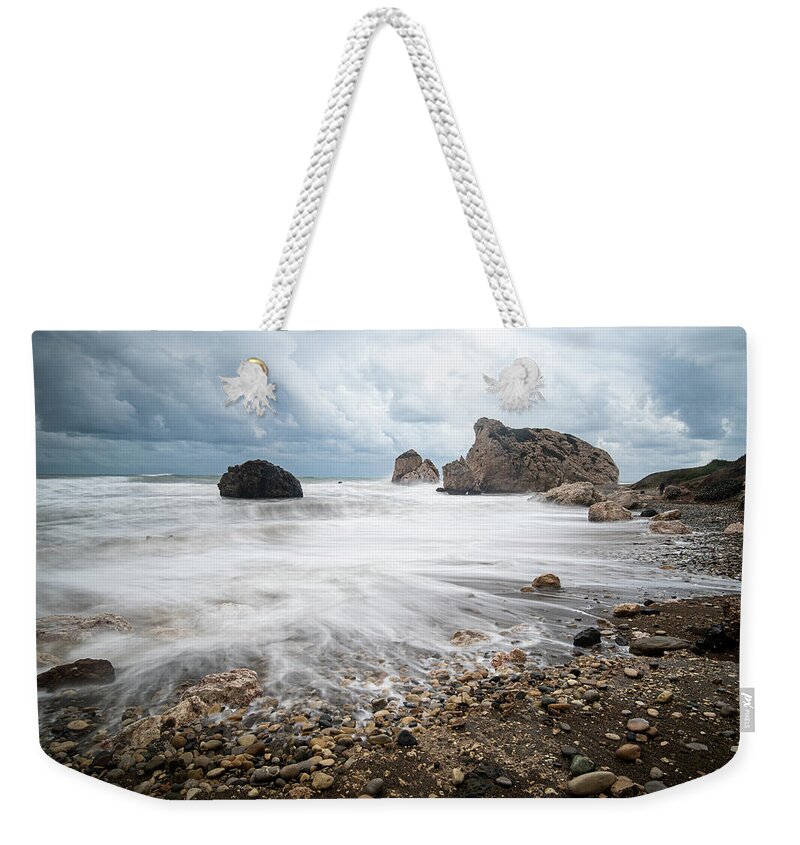 Sea Waves Weekender Tote Bag featuring the photograph Seascape with windy waves during stormy weather on a rocky coast by Michalakis Ppalis