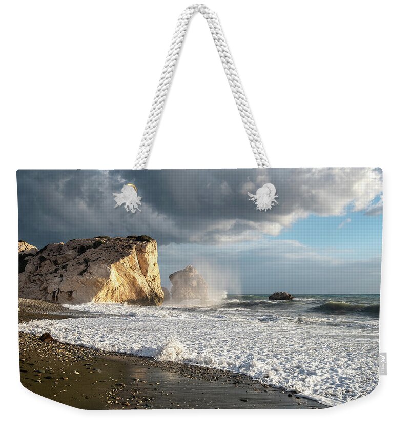 Seascape Weekender Tote Bag featuring the photograph Seascape with windy waves splashing on the coast by Michalakis Ppalis