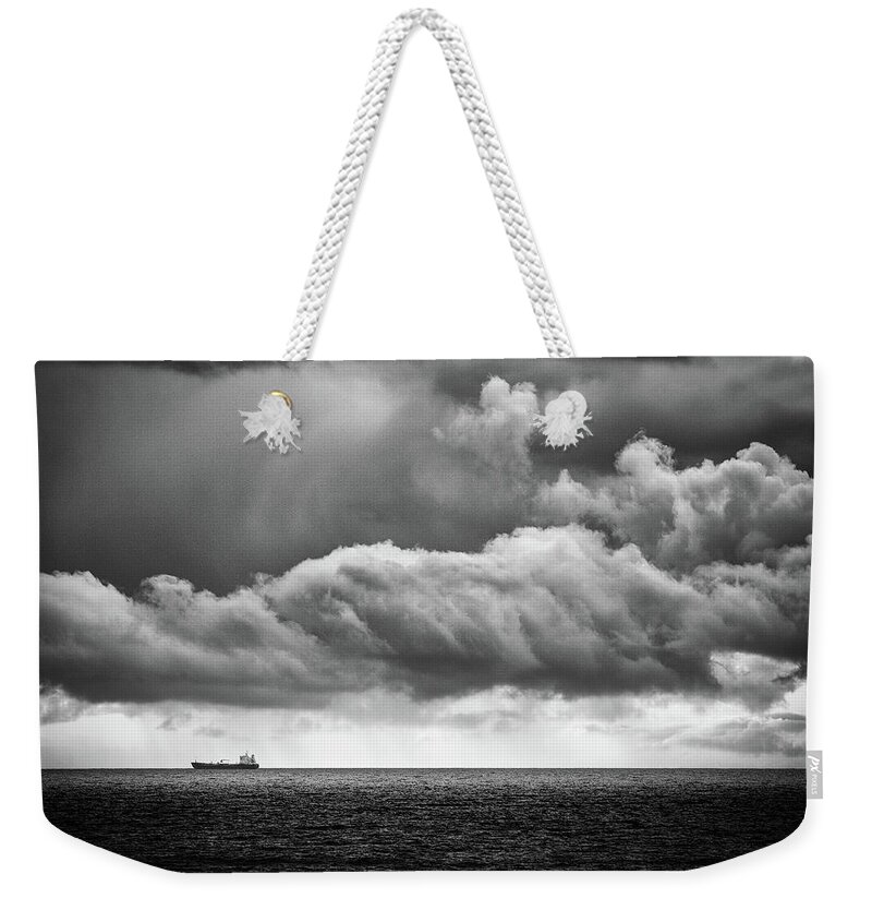 Ship Weekender Tote Bag featuring the photograph Ship on the Horizon by Nigel R Bell