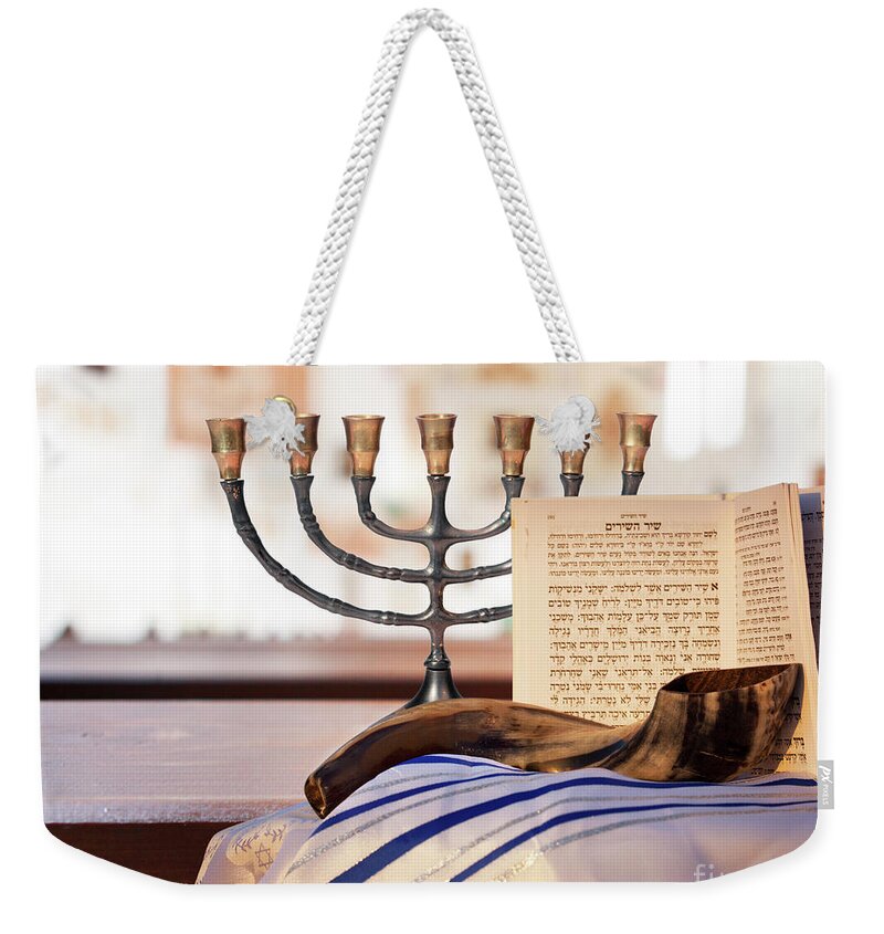 Shofar Weekender Tote Bag featuring the photograph Shofar, Menorah and Jewish prayer book by Stella Levi