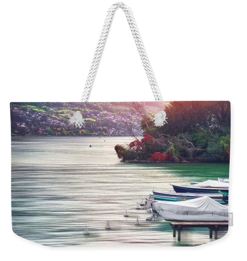 Annecy Weekender Tote Bag featuring the photograph Shores of Lake Annecy France by Carol Japp