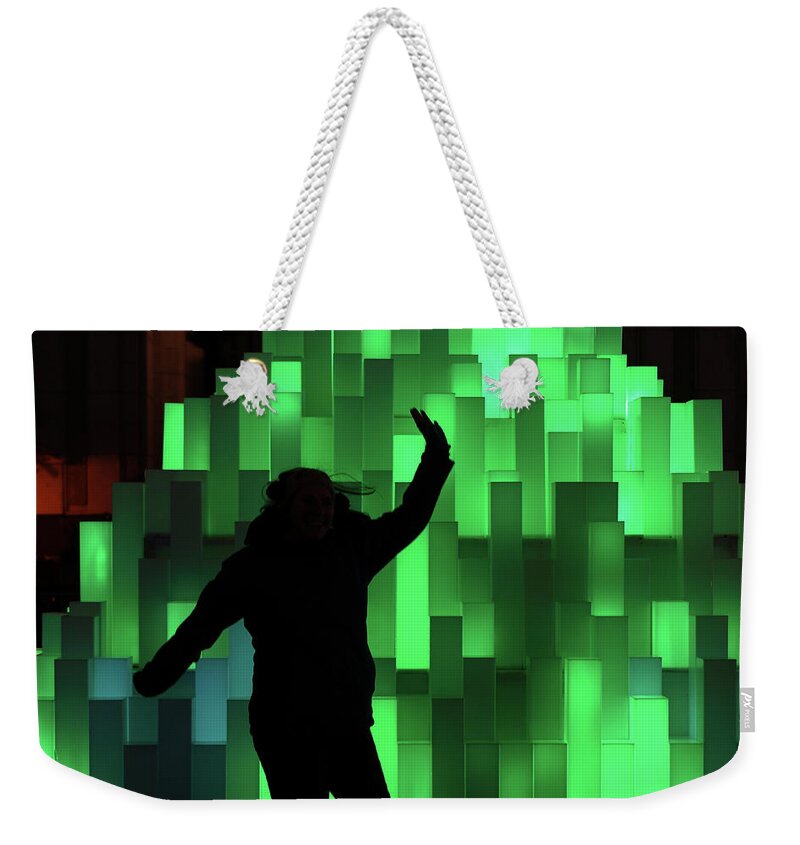 Silhouette Weekender Tote Bag featuring the photograph Silhouette of a girl on Green by Andrew Lalchan