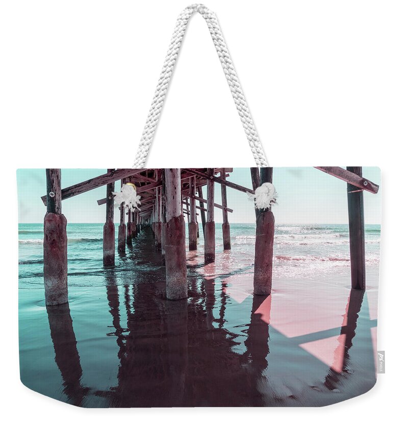 Silky Reflection Weekender Tote Bag featuring the photograph Silky Reflections in Mint Green and Pink - Californian Cool Under the Newport Beach Pier by Georgia Mizuleva