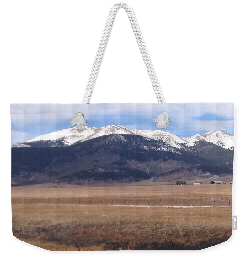 Rocky Mountains Weekender Tote Bag featuring the photograph Sky Country by Lisa White