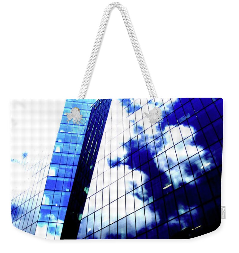 Skyscraper Weekender Tote Bag featuring the photograph Skyscraper In Clouds In Warsaw, Poland 4 by John Siest