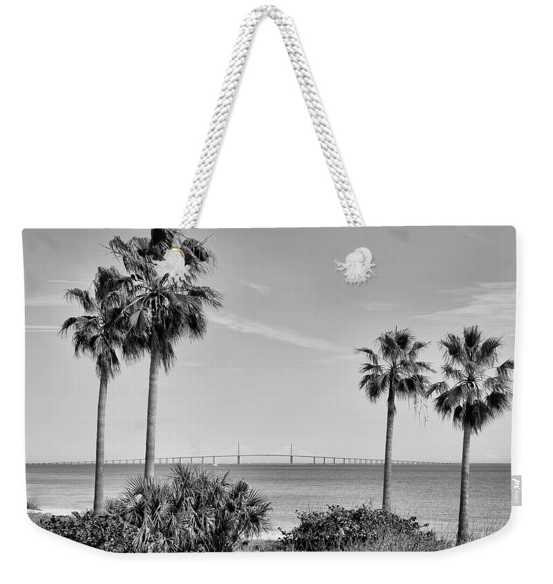 Florida Weekender Tote Bag featuring the photograph Skyway Through the Palms by Robert Wilder Jr