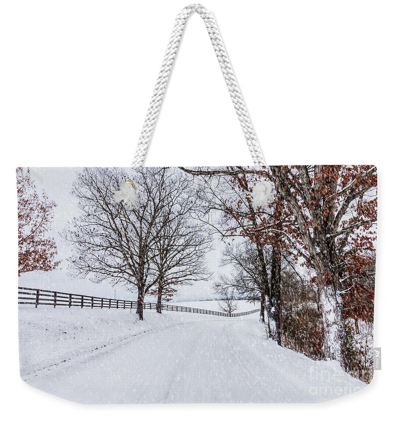 Winter Weekender Tote Bag featuring the photograph Snowy Country Drive by Jennifer White